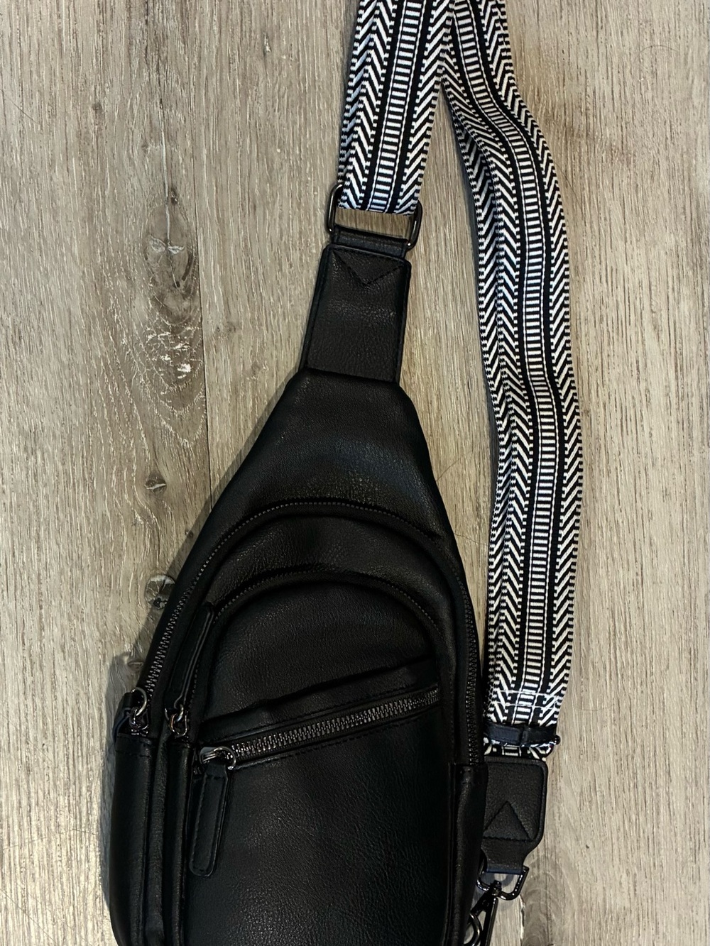 Black Crossbody Sling Bag with Patterned Strap